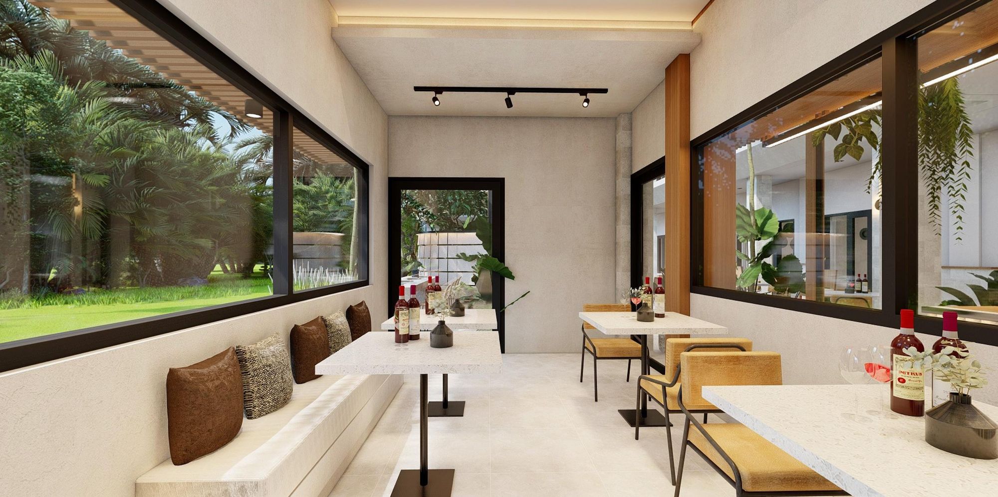 Indoor co-working and café space with banquette seating and garden windows