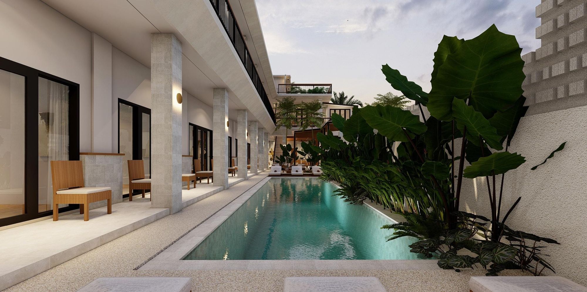 Lap pool along the ground-floor terraces, shaded by tropical plants